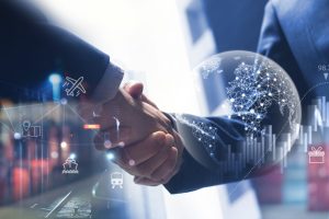 Smart logistics, Global business concept. Businessman making handshake for successful business, investment deal teamwork and partnership business partners on logistic global network distribution and supply chain